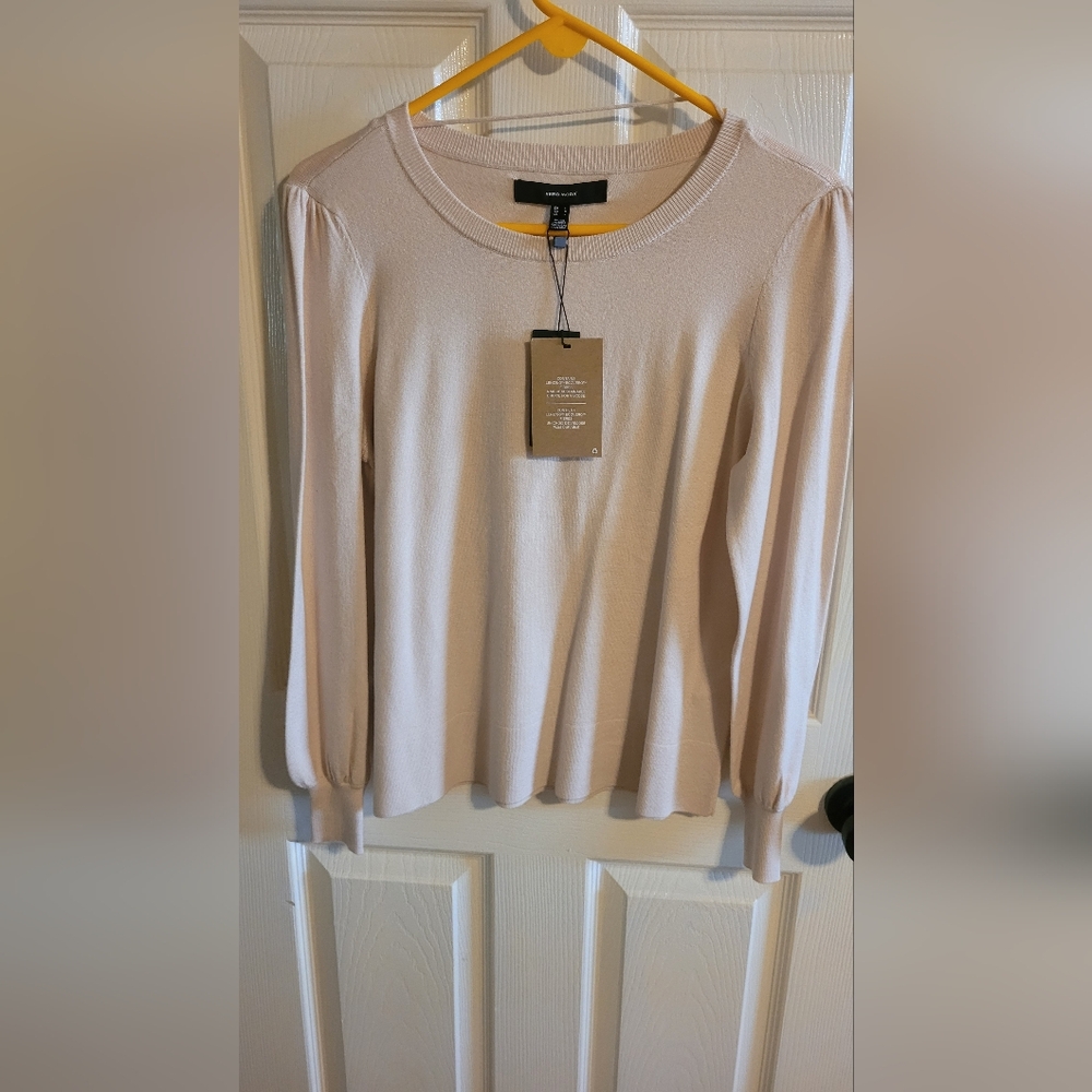Woman's cream sweater